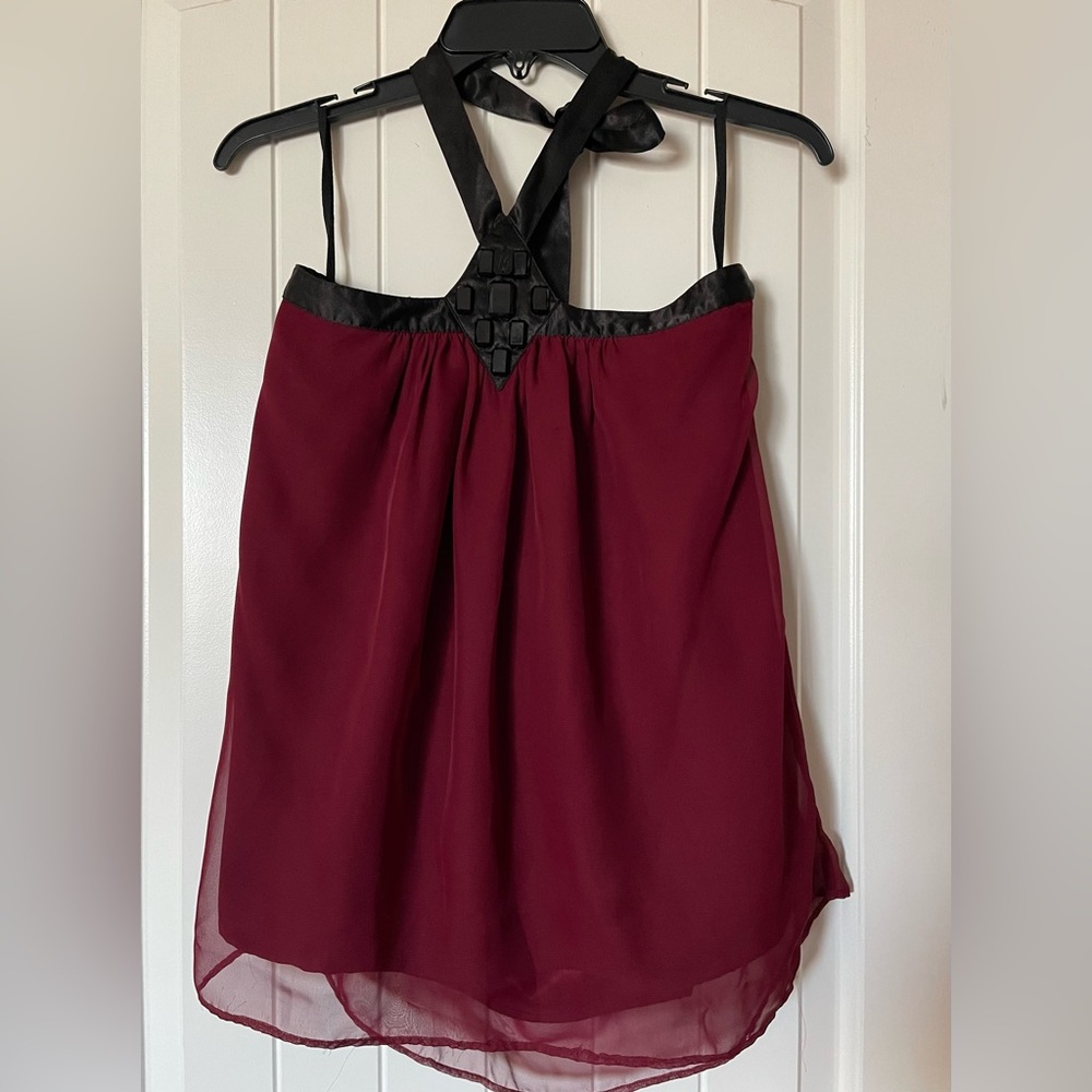 Burgundy sheer top with lining.